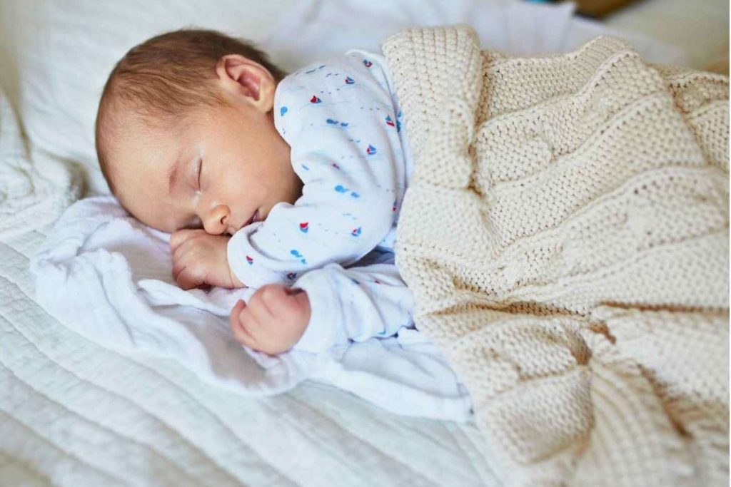 posizione per far smettere di piangere bambino